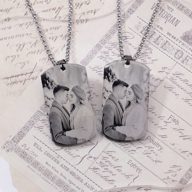 A pair of custom couple anniversary necklaces